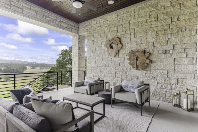 Covered outdoor living area in Ashlyn home at Belle Oaks, Bulverde TX