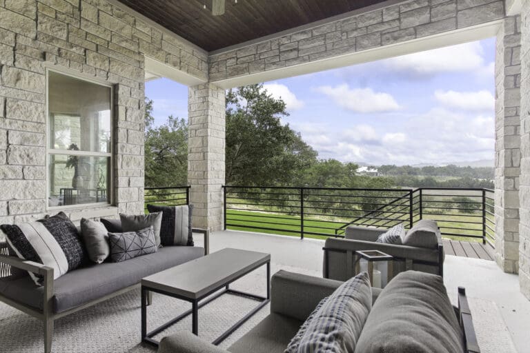 Covered outdoor living area in Ashlyn home at Belle Oaks, Bulverde TX