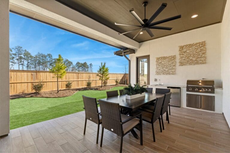 new construction homes magnolia covered patio and backyard