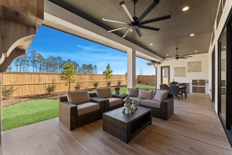 new construction homes magnolia covered patio and backyard