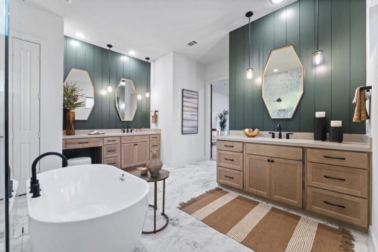 Primary bathroom in new construction home San Antonio with soaking tub and dual vanity